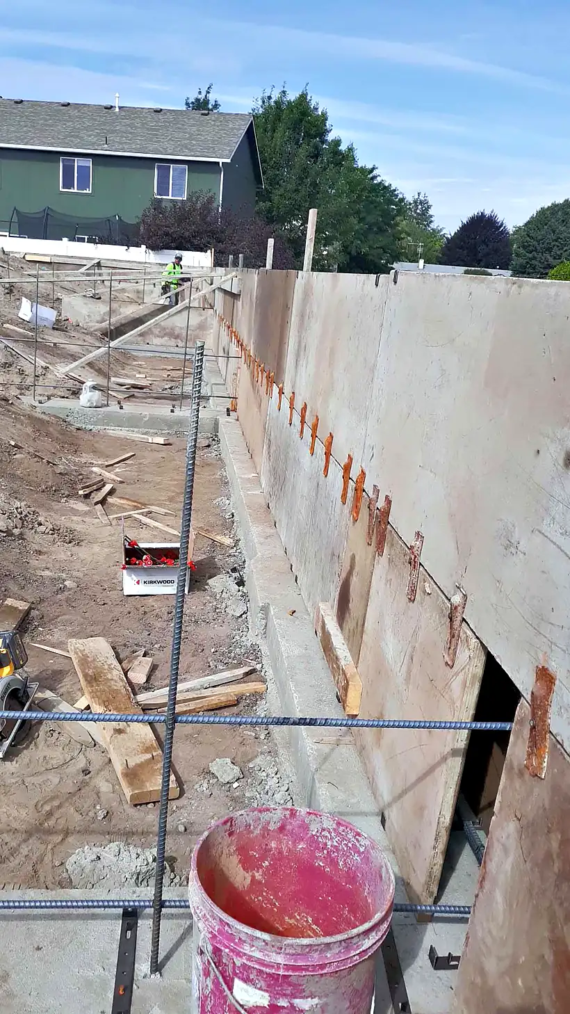 Poured concrete foundation wall for a new build